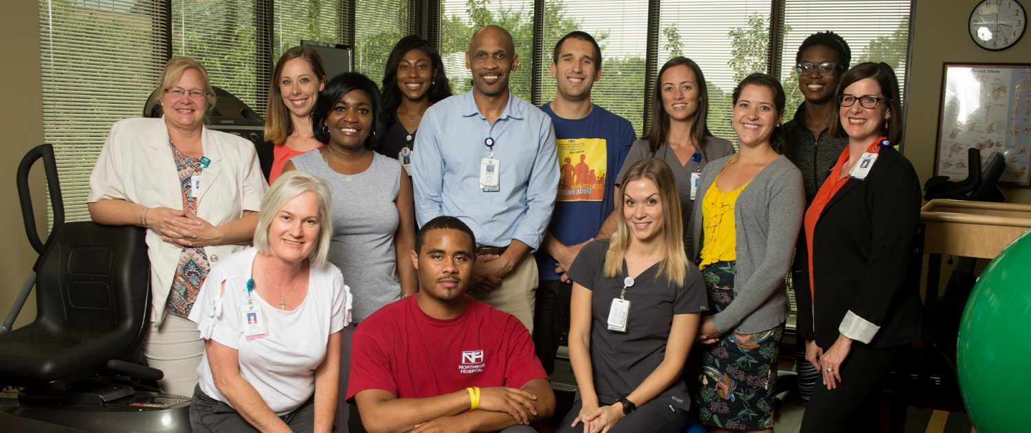 a group of smiling people